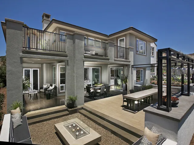 Rear elevation with a full glass door system onto the pool deck