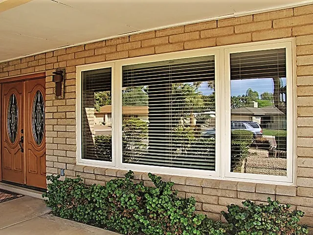 Horizontal slider windows across a brick front elevation