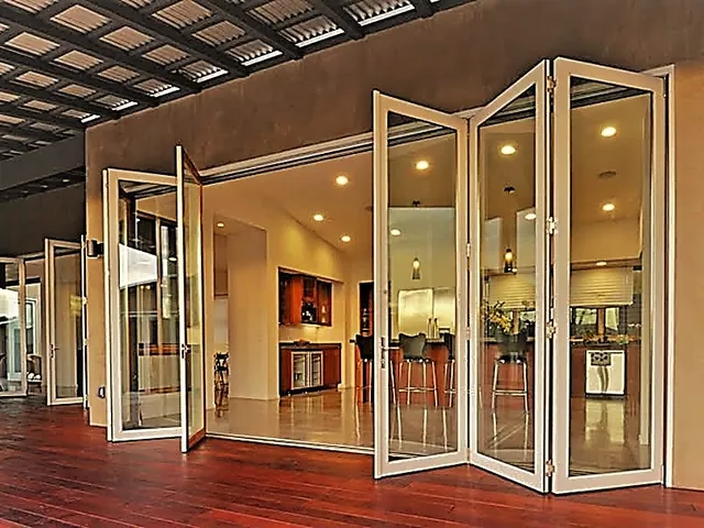 Bi-fold doors folded back across a wide opening