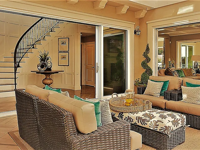 Wide glass wall along a coastal living room
