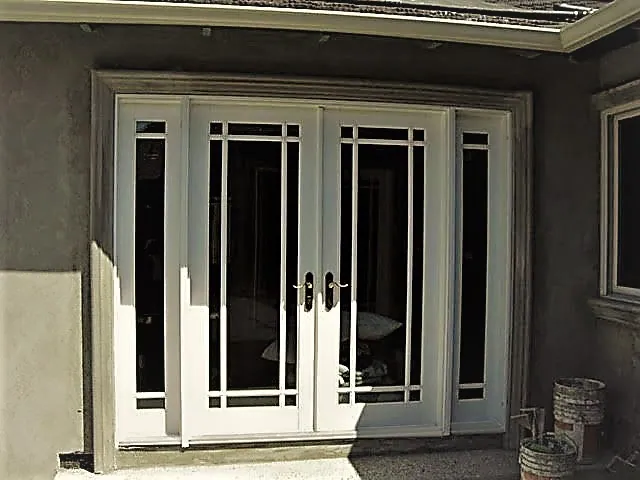 White French doors with sidelites on a rear elevation